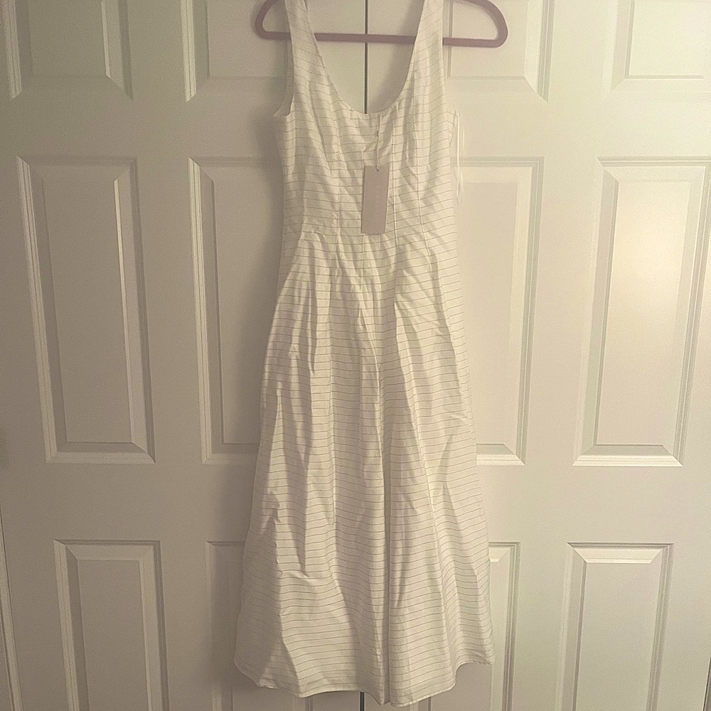 White silk jump suit
